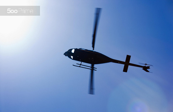 Black-Helicopter-Flying-Overhead